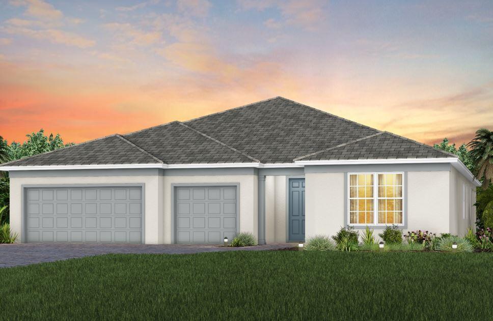 single story home with an attached garage, a front lawn, decorative driveway, and stucco siding