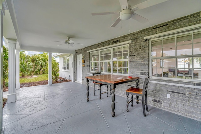 view of patio featuring ceiling fan