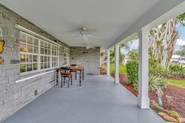 view of patio featuring ceiling fan