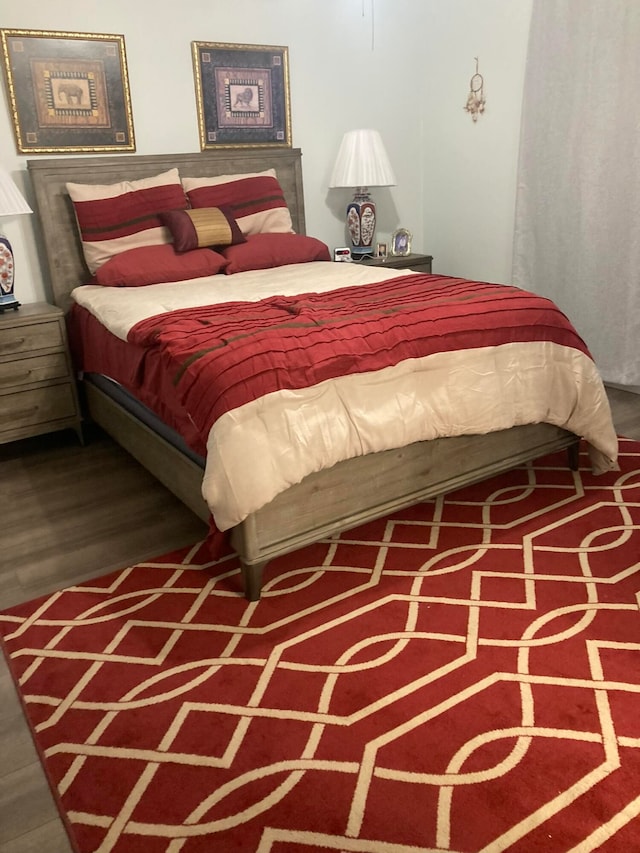 bedroom featuring dark hardwood / wood-style floors