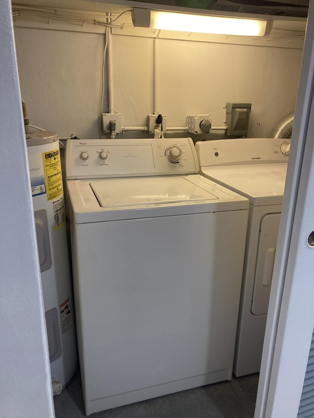 108 NE 20th Ave Unit 205, Boynton Beach, FL 33435 - laundry room with washing machine and clothes dryer and electric water heater
