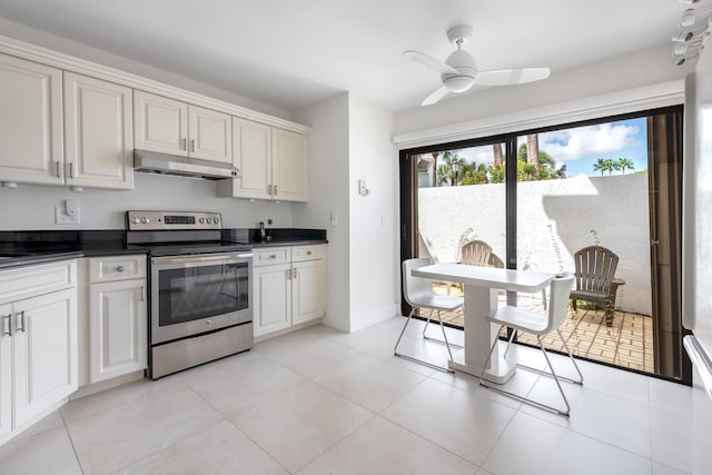 kitchen with white cabinetry, electric stove, and ceiling fan