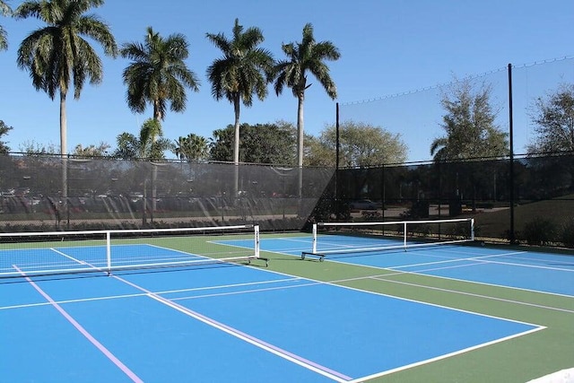 view of sport court with basketball hoop