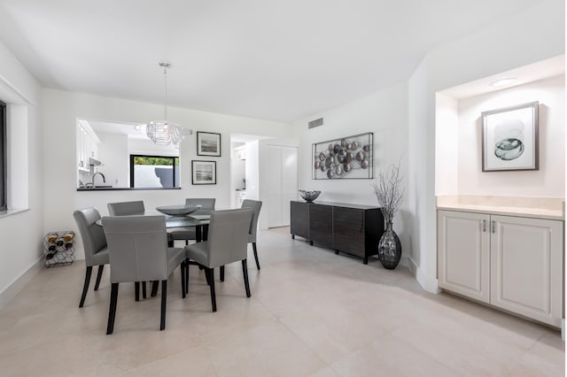 dining room with an inviting chandelier