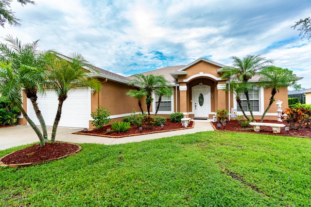 ranch-style house with a garage and a front lawn