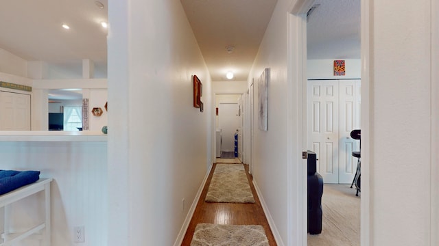 hall featuring wood-type flooring