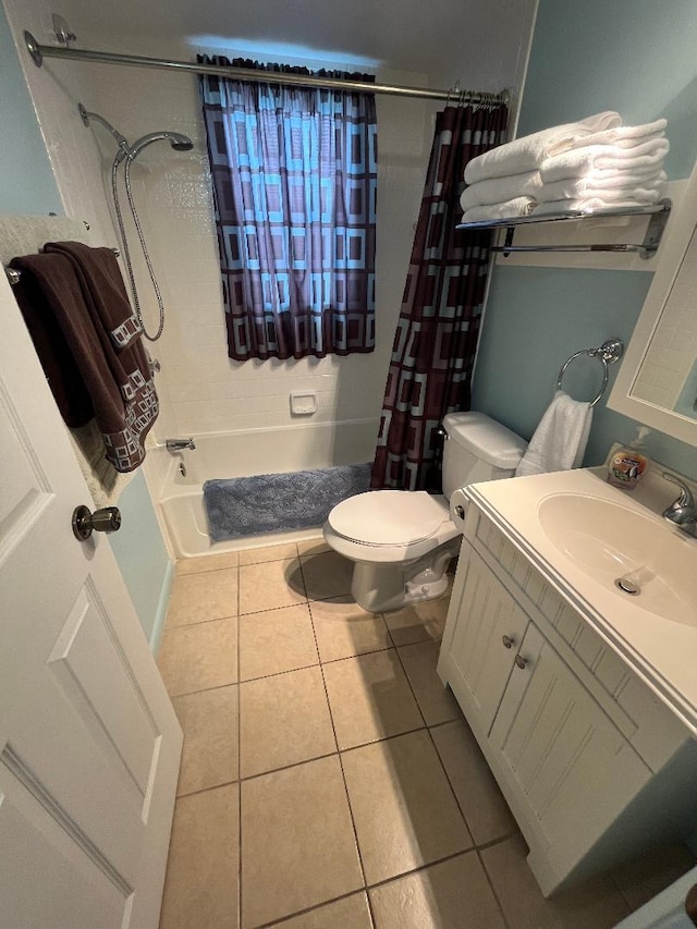 full bathroom with tile patterned flooring, vanity, toilet, and shower / bath combination with curtain