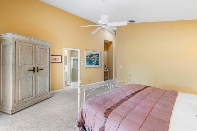 carpeted bedroom featuring ceiling fan and high vaulted ceiling