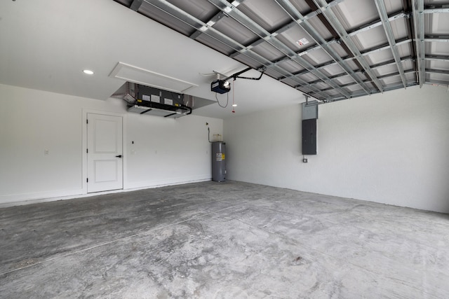 garage with a garage door opener, electric water heater, and electric panel