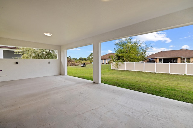 view of patio / terrace featuring fence