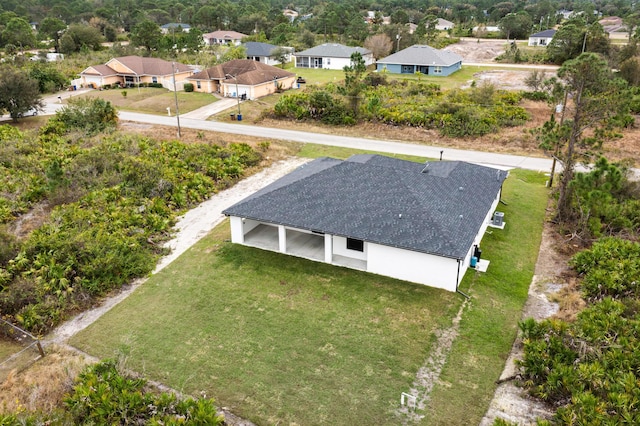 drone / aerial view featuring a residential view