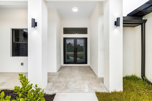 property entrance featuring french doors