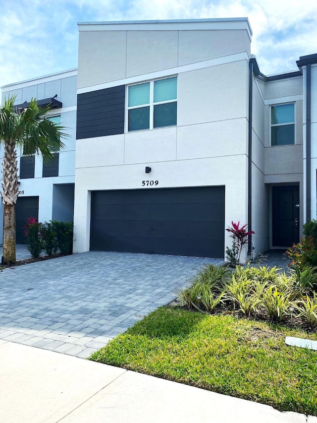 view of front of home with a garage