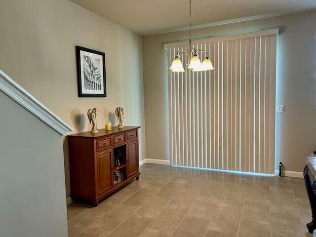 dining room featuring a notable chandelier