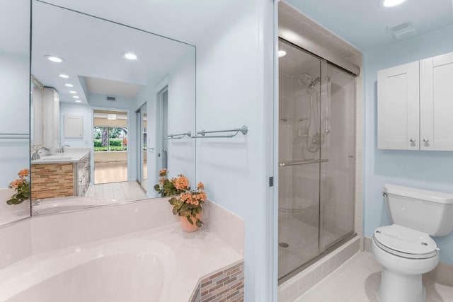 full bathroom with tile patterned flooring, vanity, toilet, and independent shower and bath