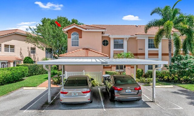 rear view of property featuring a lawn