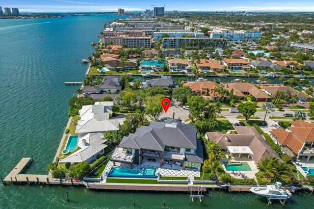 birds eye view of property featuring a water view