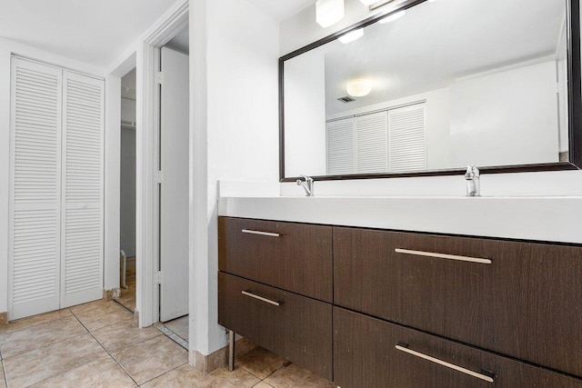 bathroom with vanity and tile patterned floors