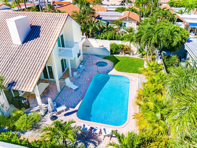 view of pool featuring a patio