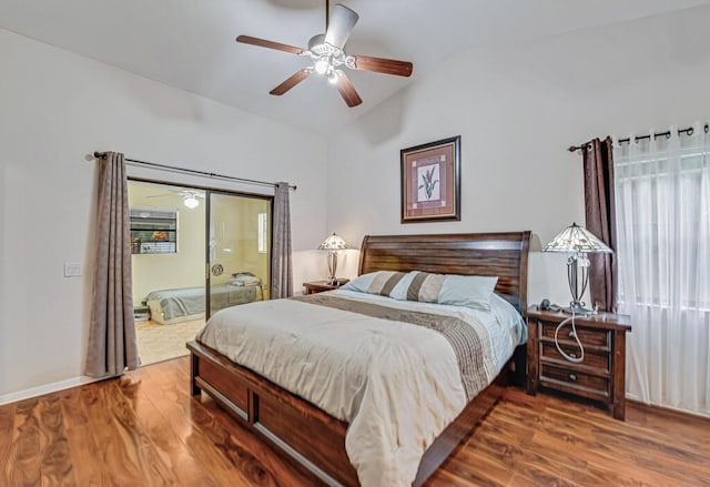 bedroom featuring lofted ceiling, hardwood / wood-style flooring, and ceiling fan