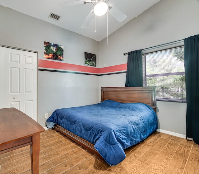 bedroom featuring a closet, ceiling fan, and light hardwood / wood-style floors