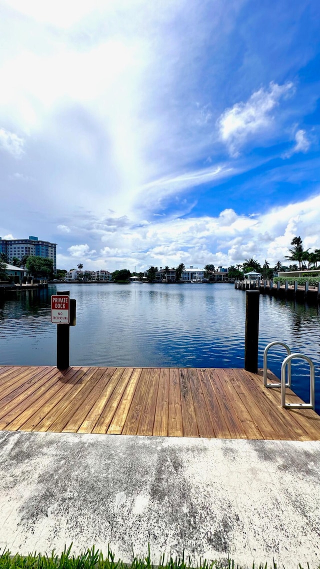 dock area featuring a water view