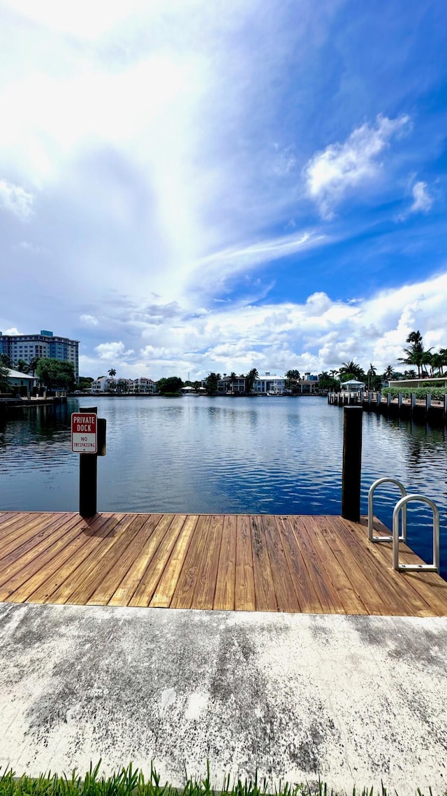 414 Seasage Dr Unit 3, Delray Beach, FL 33483 - dock area featuring a water view