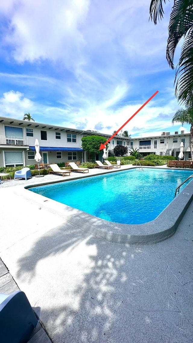 414 Seasage Dr Unit 3, Delray Beach, FL 33483 - pool featuring a patio