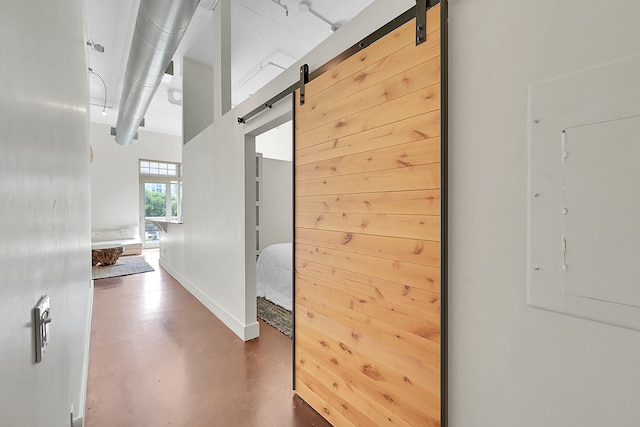 hallway with a barn door