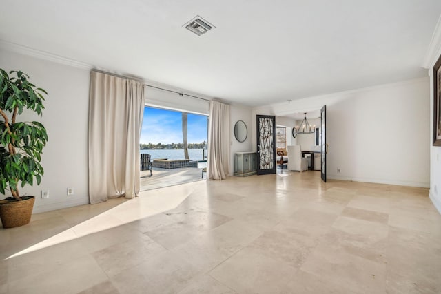 unfurnished living room with a water view, an inviting chandelier, visible vents, and crown molding