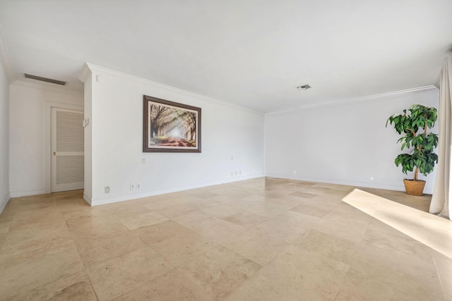 unfurnished room with ornamental molding, visible vents, and baseboards