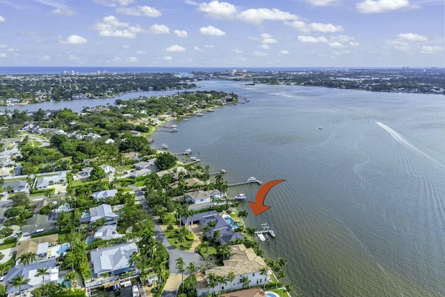 bird's eye view with a water view and a residential view