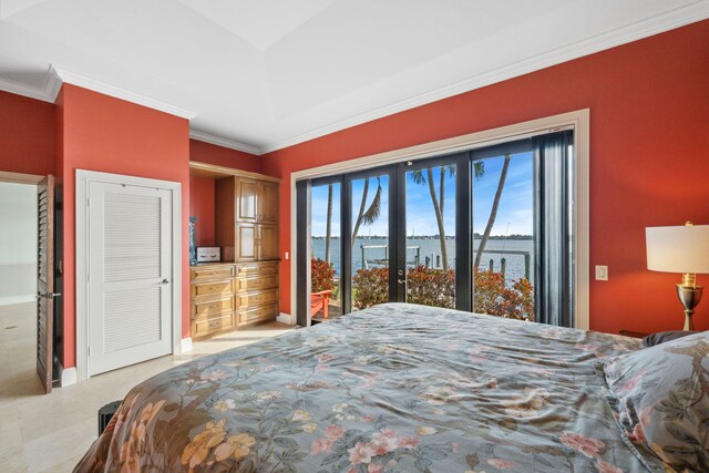 bedroom featuring a water view, baseboards, crown molding, and french doors