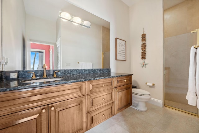 bathroom with baseboards, toilet, tile patterned floors, a shower with shower door, and vanity