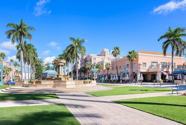 view of home's community with a lawn