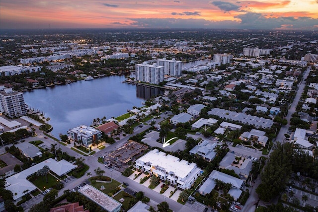 aerial view with a water view and a city view