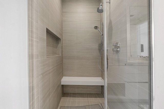 full bathroom with a stall shower