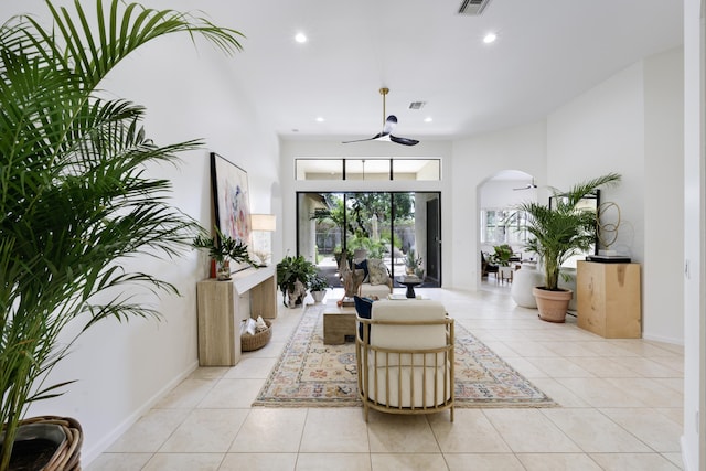 interior space featuring ceiling fan