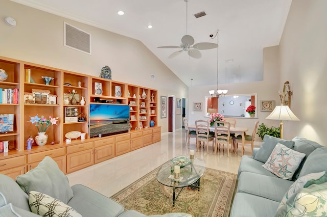 living room featuring ceiling fan with notable chandelier, high vaulted ceiling, and hardwood / wood-style floors