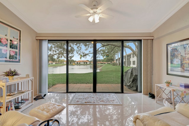 living room featuring ornamental molding, a water view, ceiling fan, and a healthy amount of sunlight