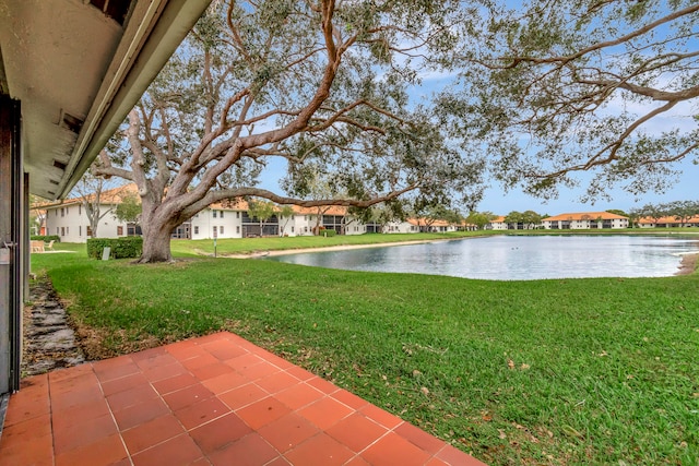 view of yard with a water view