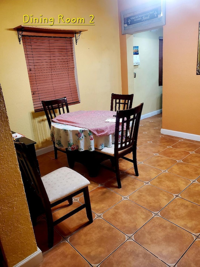 view of tiled dining area