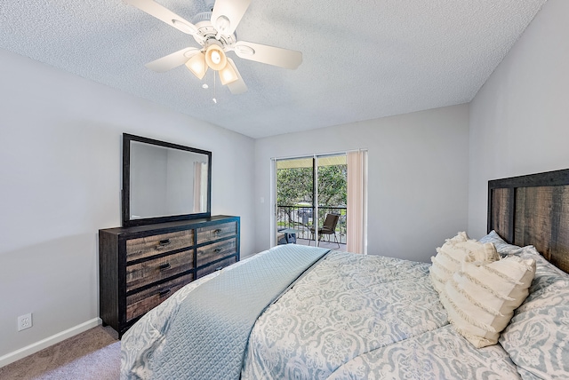 bedroom with a textured ceiling, access to outside, ceiling fan, and carpet flooring