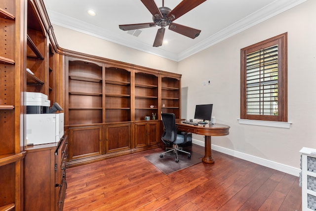 office space featuring dark hardwood / wood-style floors, ornamental molding, and ceiling fan