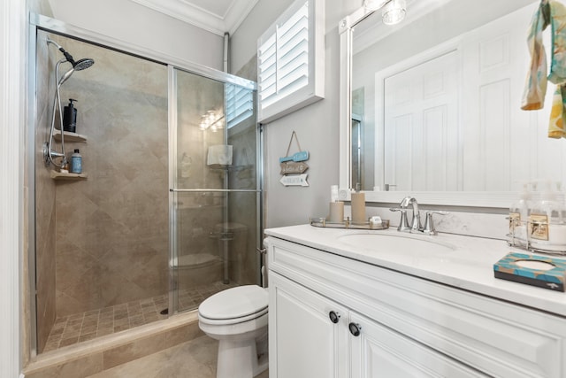 bathroom featuring ornamental molding, vanity, toilet, and an enclosed shower