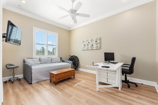 office with ceiling fan, crown molding, and light hardwood / wood-style floors