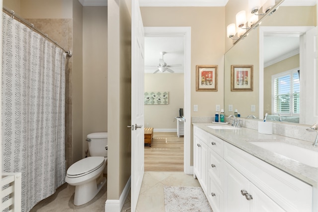 bathroom with ceiling fan, vanity, ornamental molding, wood-type flooring, and toilet