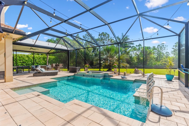 view of swimming pool with ceiling fan, a lanai, an outdoor hangout area, a patio, and an in ground hot tub