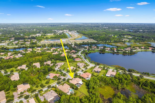 drone / aerial view with a water view