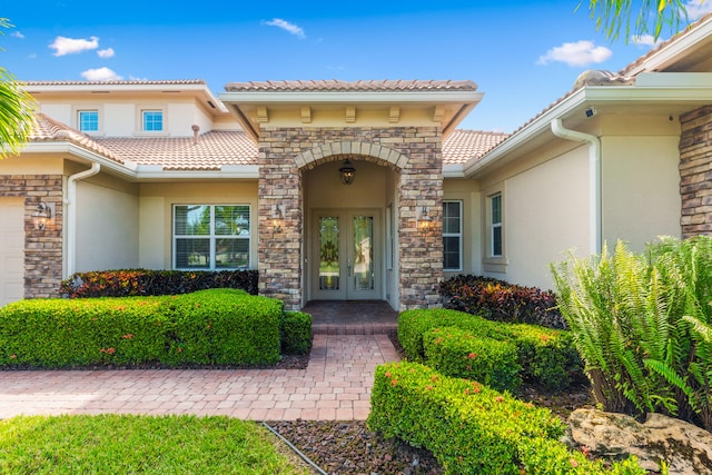 entrance to property featuring french doors